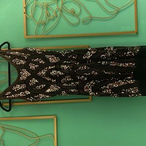 Black beaded dress with fringe on the bottom